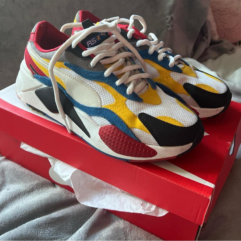 Red, White, Blue, Yellow, And Black RS-X3 Puzzle Pumas